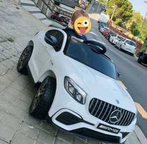 Masinuta electrica cu telecomanda 4x4 2 viteze anvelope din cauciuc Mercedes Benz GLC63 Amg Alb - Img 3