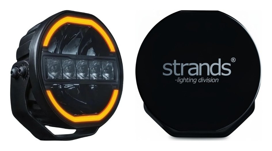 Proiector Strands Siberia Skylord 7 inch alături de capacul lui de protecție negru