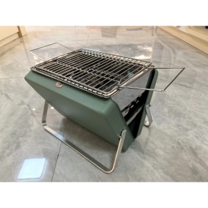 Grătar portabil pe cărbune Perfect Home, prezentând grila de gătit din oțel inoxidabil.