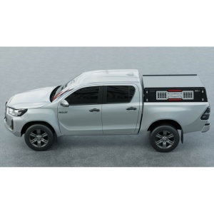Hardtopul JD10 Low montat lateral pe o Toyota Hilux, evidențiind profilul jos.