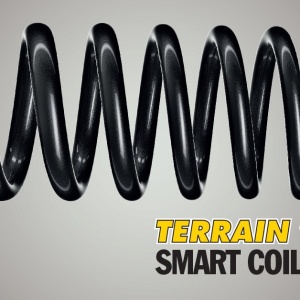 Prim-plan cu arcul elicoidal Terrain Tamer Smart Coil din kitul de suspensie.