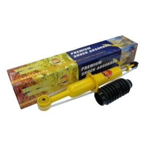 Amortizor Terrain Tamer Premium cu burduf de protecție, alături de ambalaj.