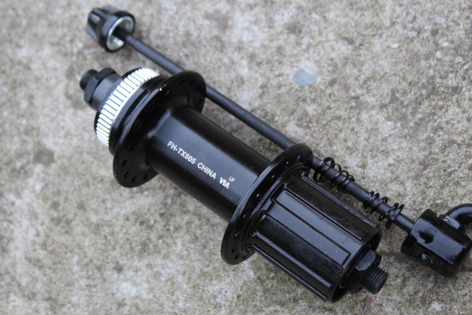 Shimano TOURNEY FH-TX505 Center-Lock butuc spate + QR - 32gauri
