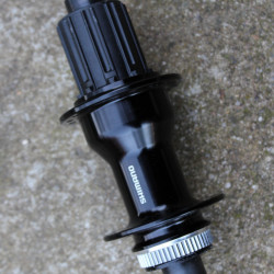 Shimano FH-TC500 8/9/10/11vit. Center-Lock butuc spate 12x148mm Boost - Img 2