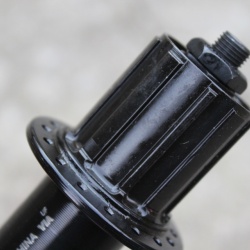 Shimano TOURNEY FH-TX505 Center-Lock butuc spate + QR - 32gauri - Img 3