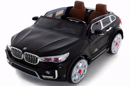 BMW X7 Dvosed za decu na akumulator sa kožnim sedištima i mekim gumama - Crni - Img 1