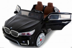 BMW X7 Dvosed za decu na akumulator sa kožnim sedištima i mekim gumama - Crni - Img 6