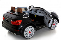 BMW X7 Dvosed za decu na akumulator sa kožnim sedištima i mekim gumama - Crni - Img 2