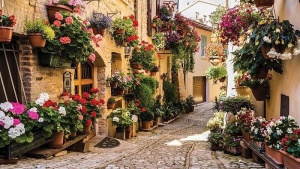 Papier Peint Panoramique XXL Villes de rues de la vieille ville avec des fleurs méditerranéennes - Photo Murale Intissé