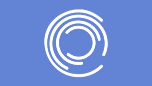 A white circle with a blue background
AI-generated content may be incorrect.
