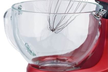 A glass bowl with wire whisk
AI-generated content may be incorrect.