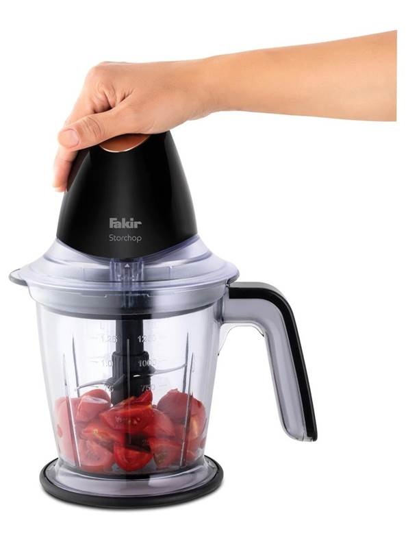 A hand holding a blender
AI-generated content may be incorrect.