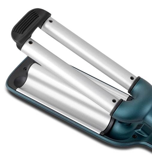 A close-up of a hair straightener
AI-generated content may be incorrect.
