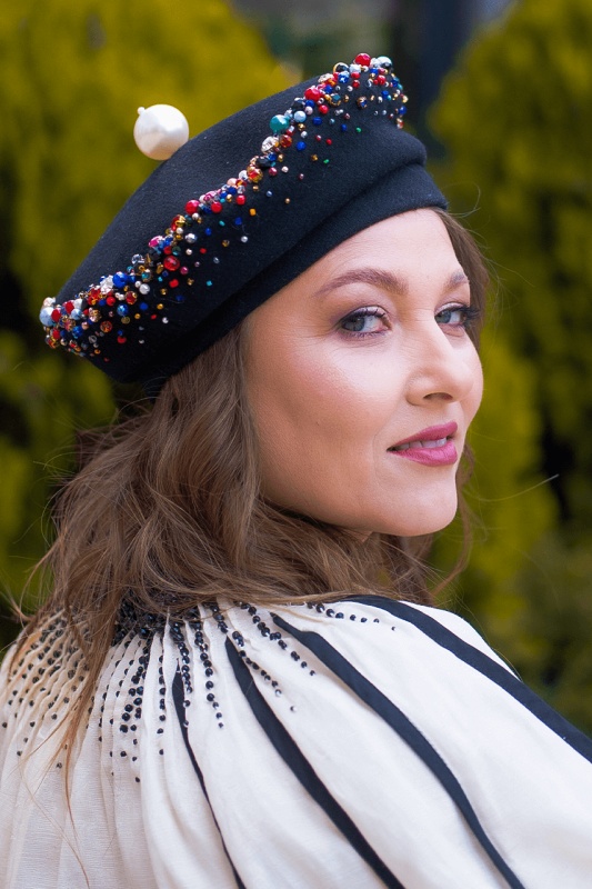 Septembria Beret-style hat made from fine black wool with colorful hand-sewn embellishments
