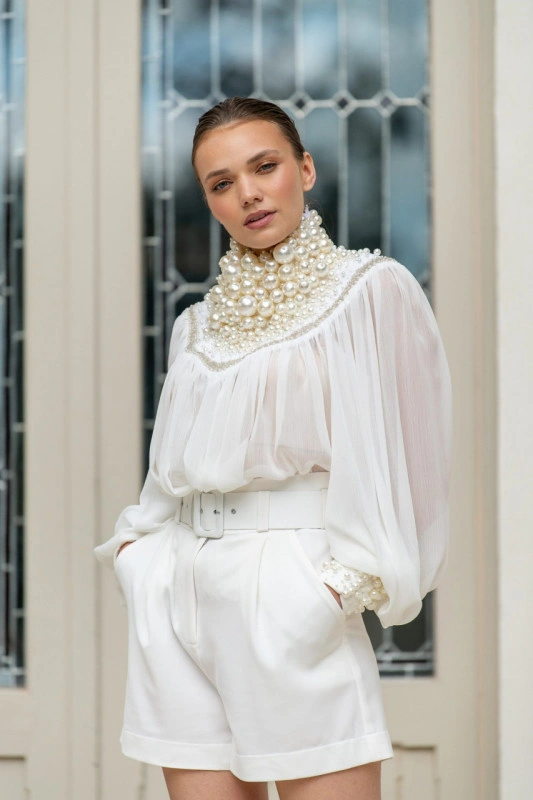 Elegant lady's jewel-type blouse