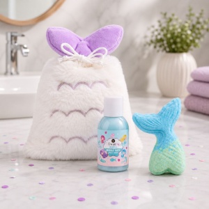 MAGICAL MERMAID children's bath set by Accentra, in a plush toiletry bag; includes bubble bath and a vanilla-scented bath bomb.