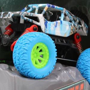 Camion Monster Truck, Craniu Albastru, Mecanism Pull-Back, 15 cm, Roti Oversized, Design Extrem
