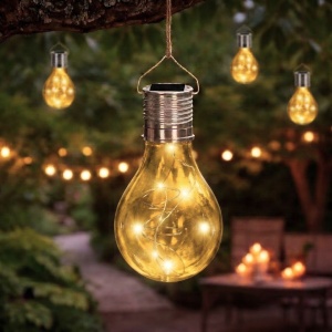 Transparent yellow bulb-shaped solar lamp, LED, for garden, patio and outdoor use