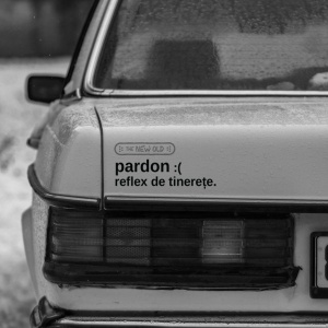 „pardon :( reflex de tinerețe.” / bumper sticker auto