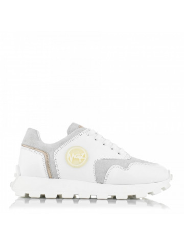 Sports shoes made of genuine leather and suede with a golden accent