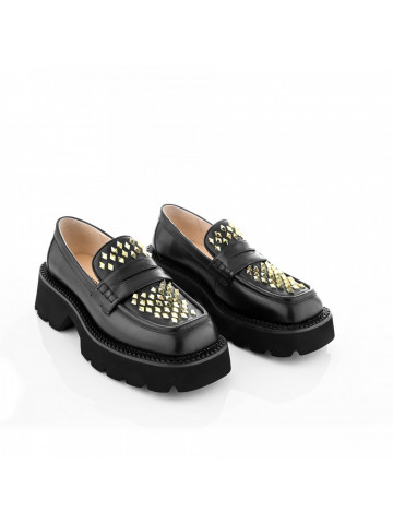 Women's loafers made of high-quality leather and attractive golden rapids