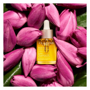 Ulei ulei de regenerare cu efect de netezire pentru fata Clarins Lotus Treatment Oil 30ml - Img 3