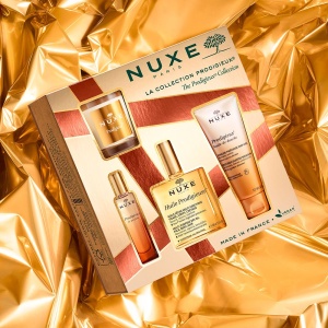Set cadou Prodigieux Nuxe, Apa de Parfum pentru Femei, 15 ml + Ulei de Dus pentru Toate Tipurile de Piele, 100 ml + Ulei Multifunctional Or pentru Fata, Corp si Par, 100 ml + Lumanare Parfumata  