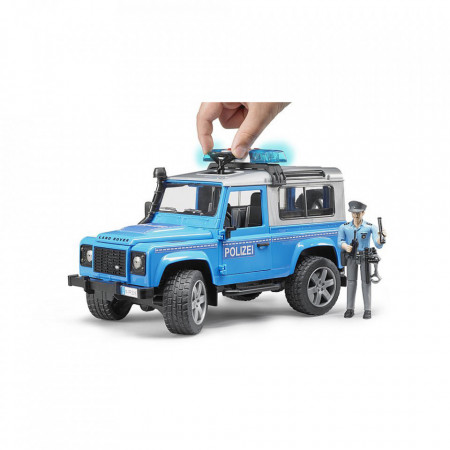 Bruder - Masina De Politie Land Rover Defender Cu Politist Si Accesorii
