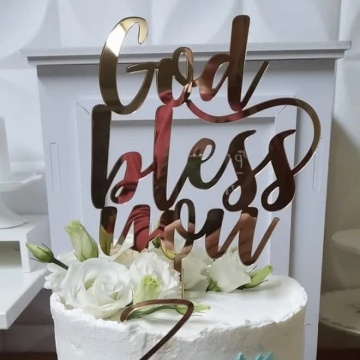 Topper tort "God bless you"