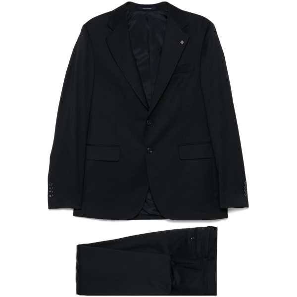 brooch-detail suit