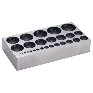 Dapping block with depressions