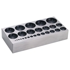 Dapping block with depressions