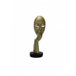 Statueta masca aurie sprijinita pe mana