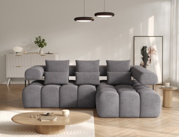 coltar extensibil ELTAP Levvi dreapta gri inchis in living modern cu perne decorative si masa rotunda din lemn