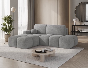 colțar extensibil stânga ELTAP Vittario gri Royal 04 bouclé în living luminos cu plantă decorativă și măsuță rotundă