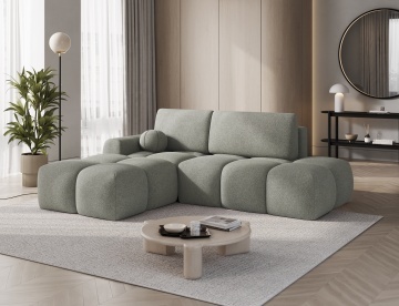 colțar Vittario verde salvia amplasat în living modern cu măsuță și covor deschis