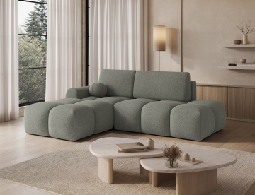 colțar extensibil Vittario în living luminos lângă fereastră cu perdele