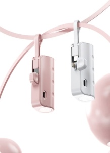 Power bank plugged into phone for fast charging