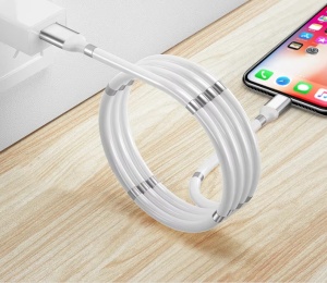 Self-winding auto-retract cable in black and white variants