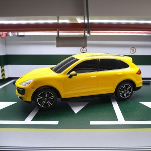 MASINA CU TELECOMANDA PORSCHE CAYENNE TURBO GALBEN CU SCARA 1 LA 24 - Img 4