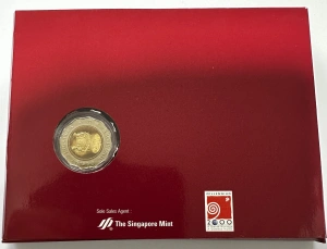 Monedă comemorativă bimetalică de 5 dolari, emisă de Singapore în anul 2000 pentru celebrarea noului mileniu.