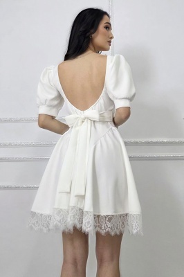rochie alba cu design romantic reinterpretat modern