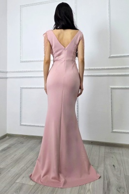 rochie lunga de seara roz cu aplicatie florala tridimensionala pe umar ce adauga volum si expresivitate tinutei