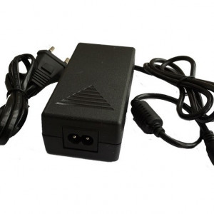 Sursa de alimentare Vidy VD-S1A, iesire 12V 1A, model compact tip stecher pentru utilizare la interior, protectie la supratensiune si scurtcircuit, ideala pentru camere de supraveghere, routere sau alte echipamente electronice