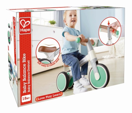 Bicicletă de echilibru Hape verde cu 3 roți – jucărie educativă pentru copii.