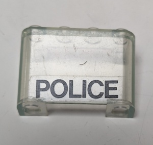 4284pb01-12G Ruit 2x4x2 omgekeerd met POLICE (Sticker) transparant gebruikt *5S012