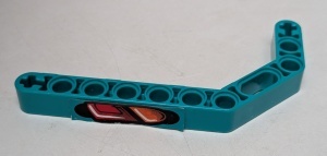 32009pb004L-39G Technic, Hefbalk 1x11.5 Dubbelgebogen dik met koplampen LINKS (sticker) turquoise, donker gebruikt *5S026