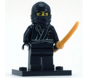 col01-12 Ninja, zwart met parelgoud ninja zwaard en standaard zonder instructie NIEUW *0M0000