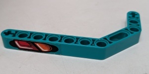 32009pb004R-39G Technic, Hefbalk 1x11.5 Dubbelgebogen dik met koplampen RECHTS (sticker) turquoise, donker gebruikt *5S027