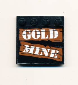 6179pb006-11G Tegel 4x4 met noppen zijkant met GOLD MINE (Sticker) zwart gebruikt *5T11-01